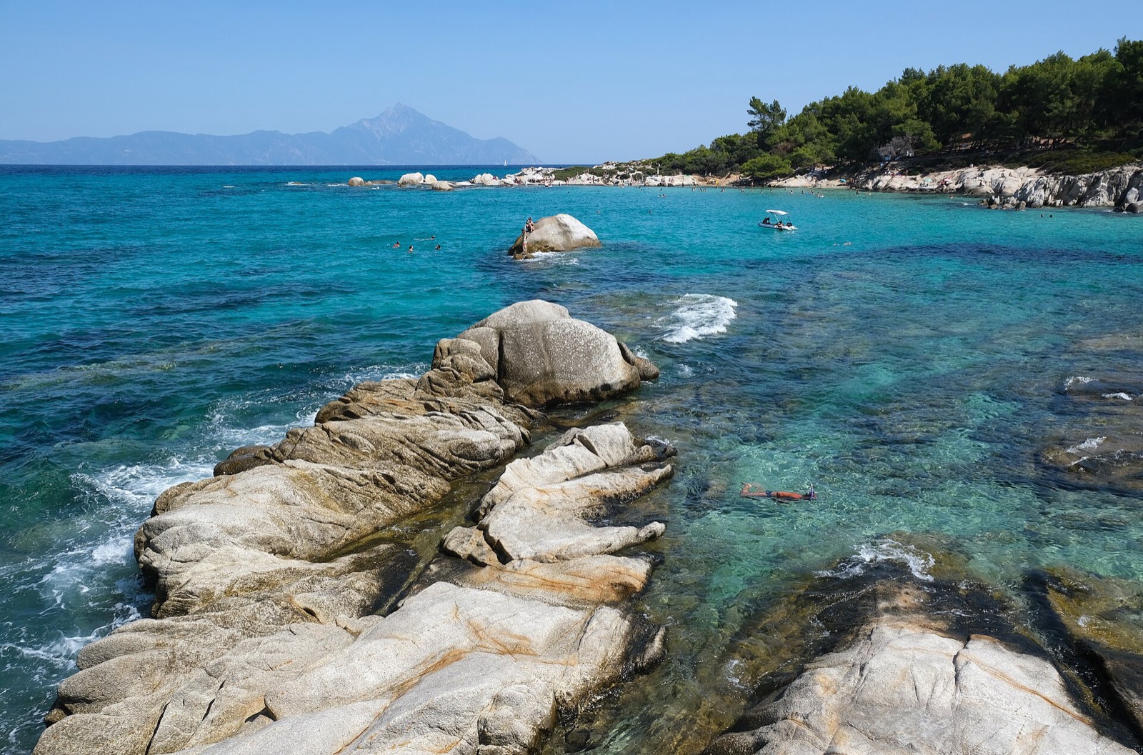 Turquoise water and white rocks at Kavourotrypes beach in Halkidiki